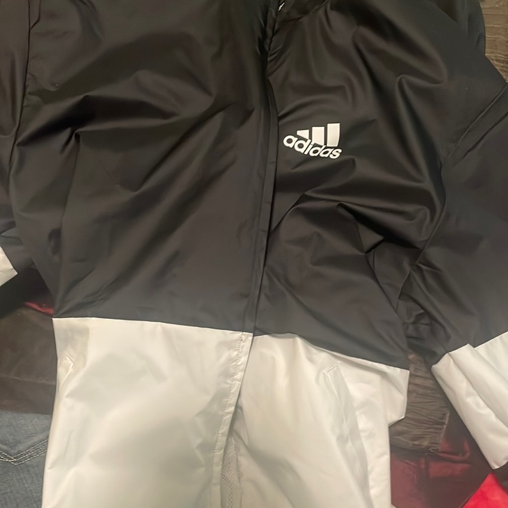 Brand new never been worn Adidas hooded wind breaker